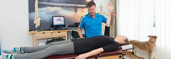 Chiropractor Amsterdam NH J.G. Drewry Evaluating Patient Chiropractor Amsterdam NH J.G. Drewry Evaluating Patient